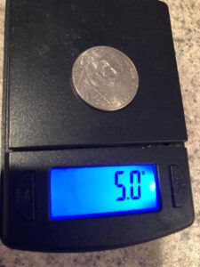 How much does a nickel weigh?