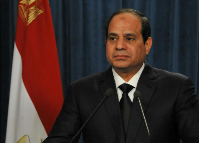 Egyptian President Abdel Fattah el-Sisi speaking at podium