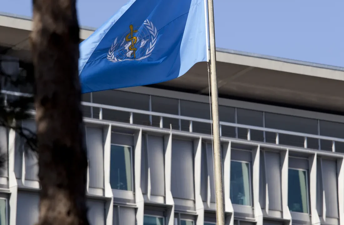World Health Organization headquarters and flag in Geneva