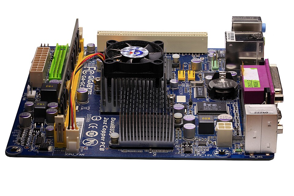 A computer motherboard with a central processor and cooling fan